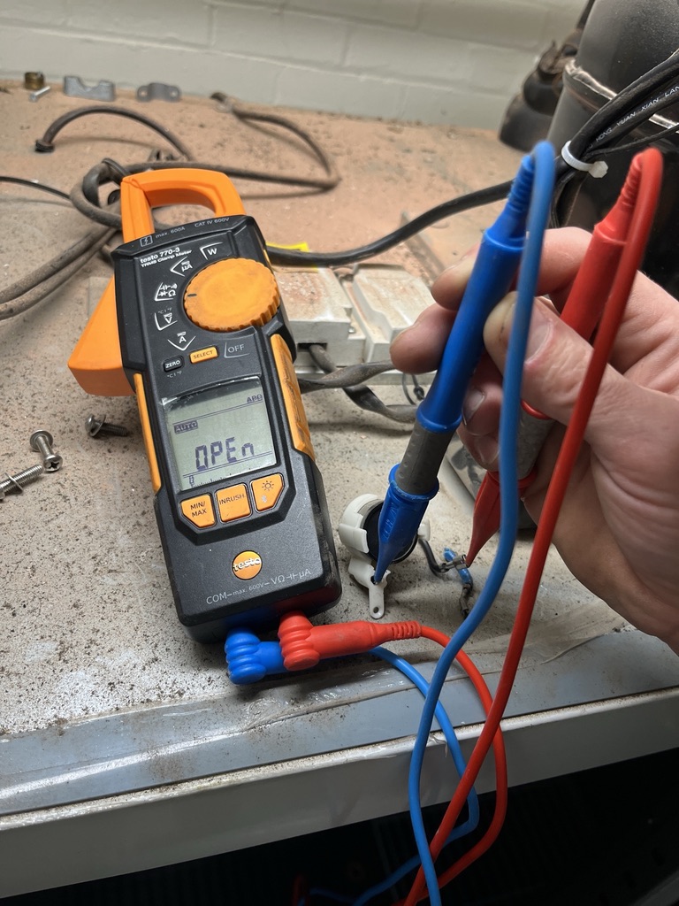 Electrical component being checked with a professional meter