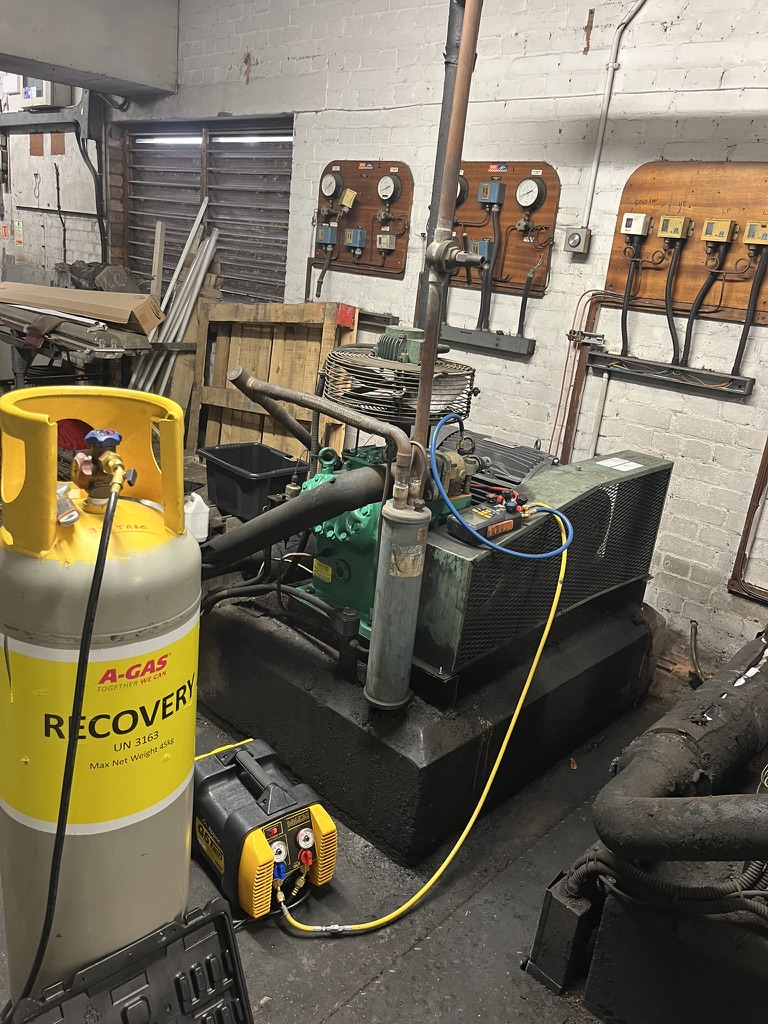 Refrigerant being safely recovered from commercial refrigeration plant
