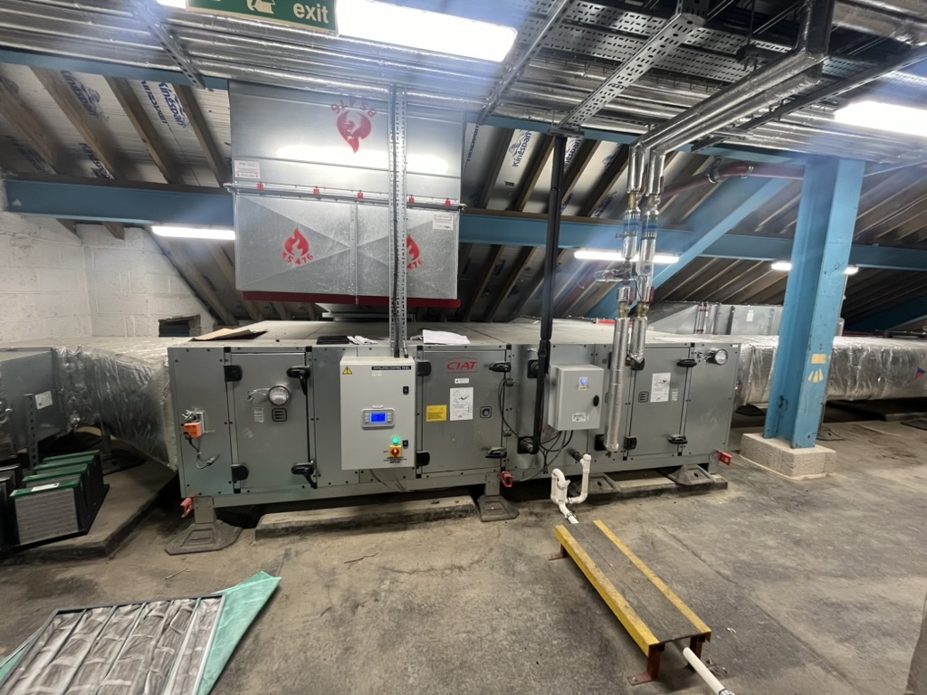 Large commercial air handling unit installed in a plant area
